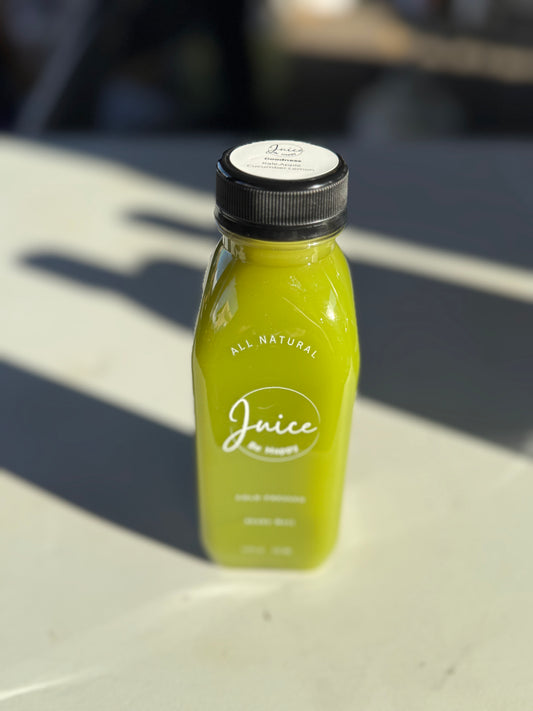 Juice Be Happy Goodness blend  cold pressed kale, cucumber, apple, and lemon juice in a glass bottle for energy and immunity boost.