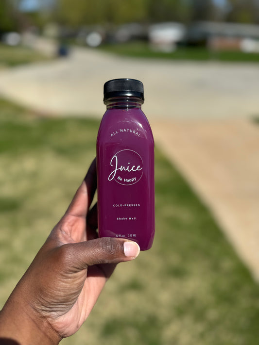 Juice Be Happy Kindness blend  cold pressed purple cabbage, apple, and ginger juice in a glass bottle rich in antioxidants and gut support.