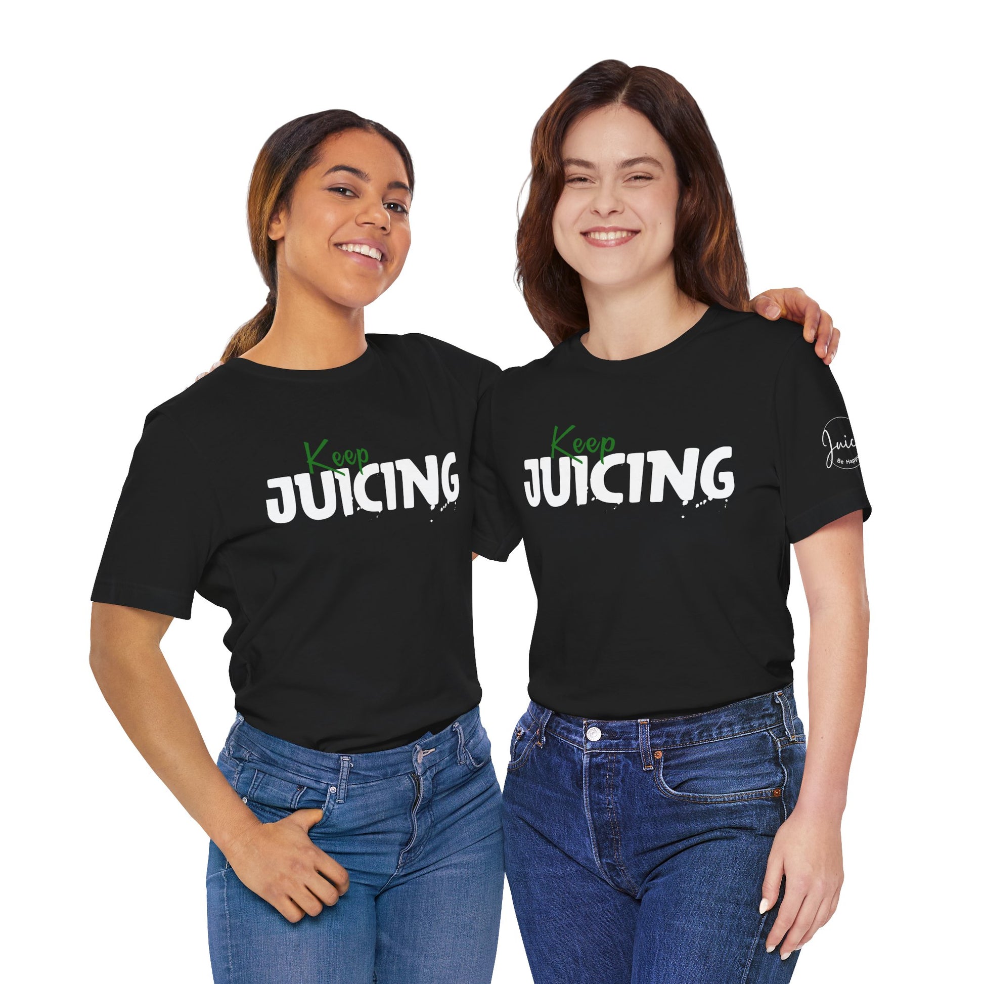Two women wearing black t-shirts with 'Keep Juicing' text on a white background