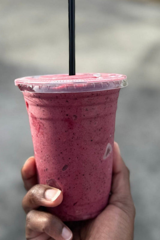 Juice Be Happy Water to Wine Smoothie cold pressed blend of bananas, strawberries, blueberries, raspberries, and diluted apple juice in a glass bottle for antioxidants, digestion support, and natural energy.